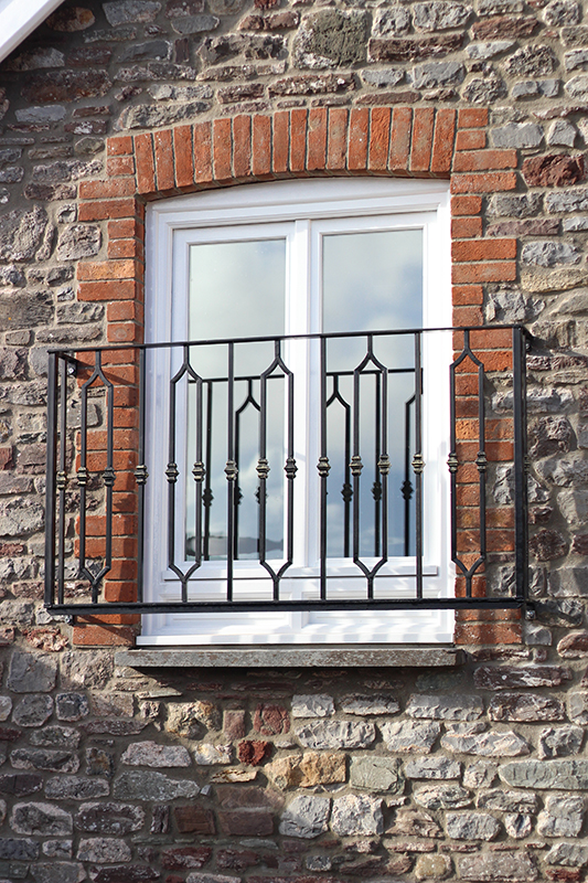 Forged iron balcony and balustrade
